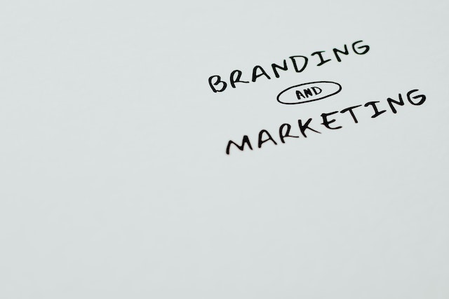 Branding and marketing written on a white paper